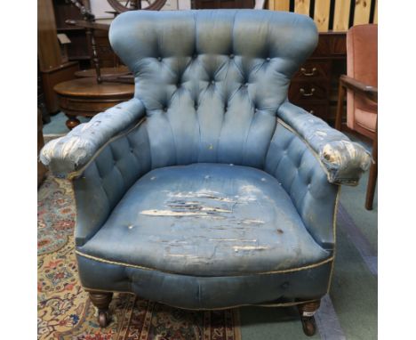 A Victorian oak framed button back armchair Condition Report: Available upon request