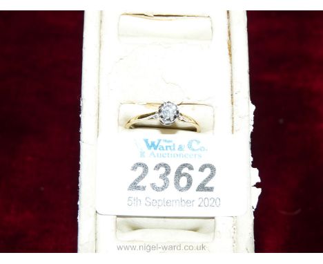 An 18ct. gold diamond solitaire ring.