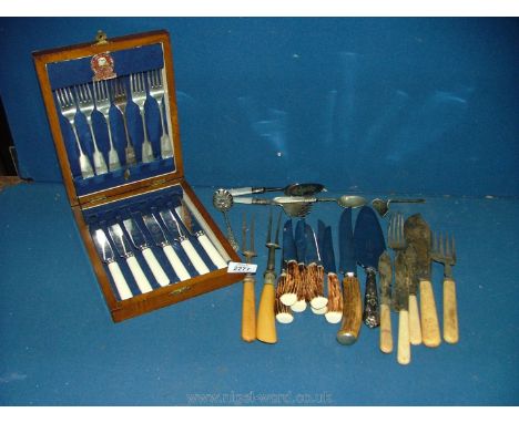 A cased set of stainless steel dinner knives and forks together with horn handled steak knives, Sheffield 1965 silver handle 