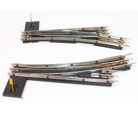 One each L/h &amp; R/h Merkur 2’ radius 3-rail electric (manually operated) points. Hornby compatible. As new