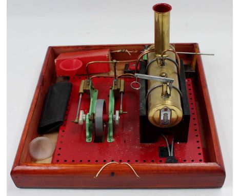 Mamod Stationary Steam Plant comprising a horizontal boiler, take off, powering a twin-cylinder engine with central flywheel,