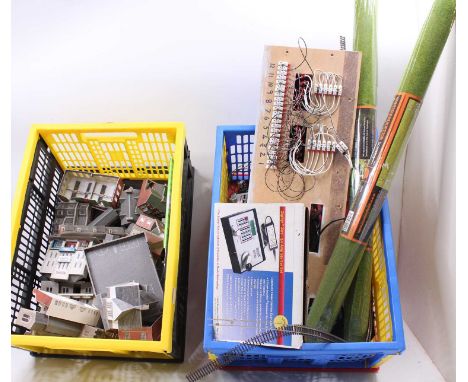 Two boxes containing a quantity of various track digital controllers, layout card buildings, all as removed from ex-railway l