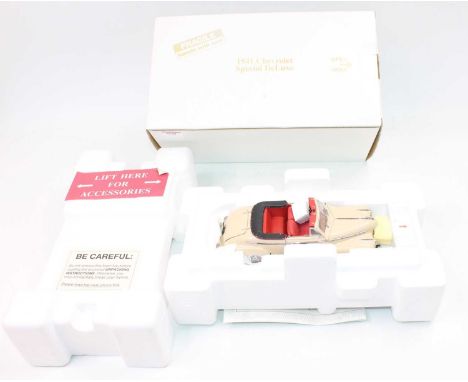 Franklin Mint 1/24th scale diecast model of a 1941 Chevrolet Special De Luxe, finished in pink and housed in the original box