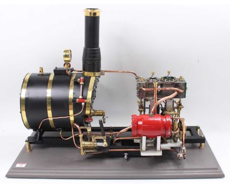 A very well made stationary steam plant, comprising large gas powered brass bound boiler, fitted with sight glass, take-off p