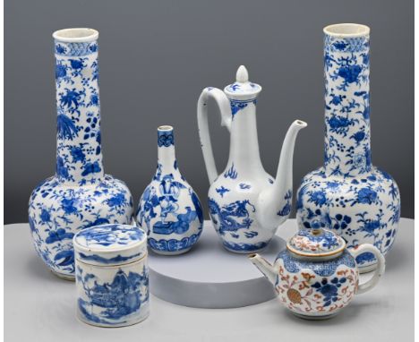 A collection consisting of a pair of blue and white bottle vases, 19th century, the globular body below a tall cylindrical ne