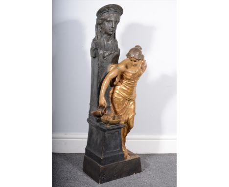 A large Art Nouveau terracotta figure by a fountain, by Goldscheider, late 19th century, patinated and gilt finish, the maide