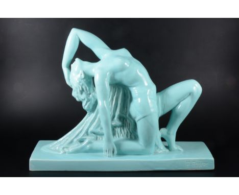 An Art Deco ceramic sculpture of a nude, by Henri Fugère, in duck egg blue glaze, signed to the rectangular plinth, width 44.