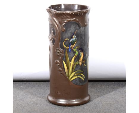 An Art Pottery stick stand, by Bretby, circa 1900, painted with Kingfishers sitting on reeds, pressed mark no. 811, 58cm.