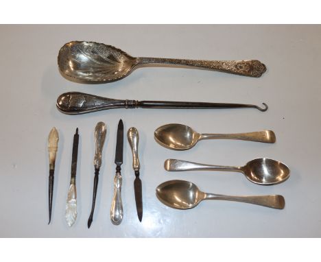 Three silver teaspoons, a collection of silver handled and other manicure items, silver handled button hook etc