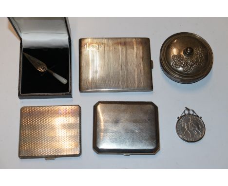 Two silver cigarette cases and a 925 silver pot and cover approx. total weight 269gms; a white metal cigarette case; a mounte