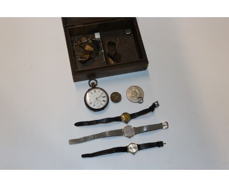 A floral decorated trinket box and contents including pocket watch, wrist watches and watch parts