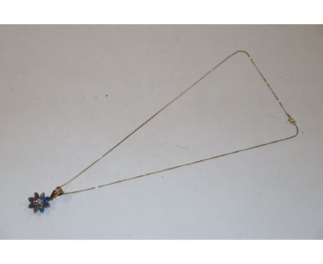 A 9ct gold opal triplet and diamond set floral design pendant hung to fine link chain approx. 3gm total weight