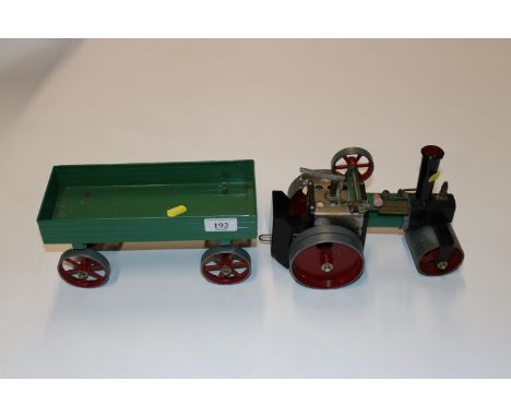 A mamod model steam engine and trailer 