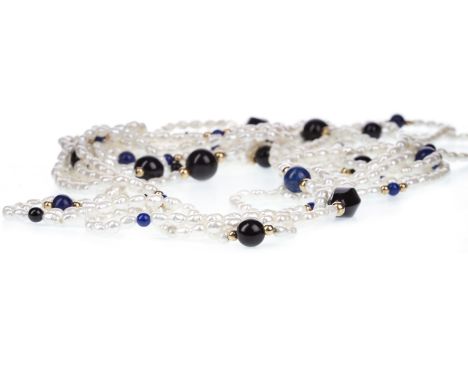 FOUR PEARL NECKLACES, each formed by oblong pearls, approximately 3-5mm, two necklaces also with black beads, possibly onyx, 