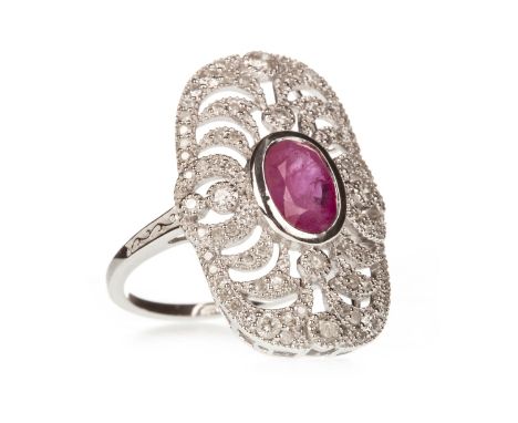 RUBY AND DIAMOND RING, the oval ruby within an openwork diamond set bezel 22mm long, the diamonds totalling approximately 0.4