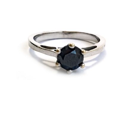 BLACK GEM SET RING, the round black gem 5.9mm diameter, marks indistinct, size O 1/2, 3.6g