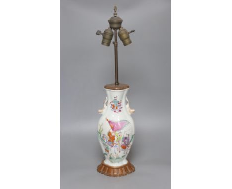   A Chinese famille rose converted lamp, late Qing, overall height 66cm