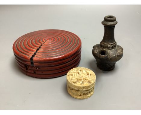   A Chinese cinnabar lacquer, a bronze vase and a carved ivory box
