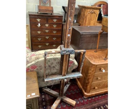   An Edwardian adjustable studio easel, width 66cm