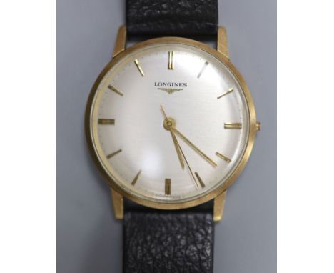   A gentleman's 1960's 9ct gold Longines manual wind wrist watch (lacking winding crown), with case back inscription.