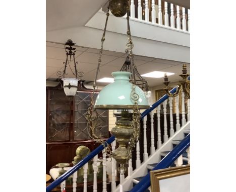   An early 20th century brass hanging oil lamp, drop 85cm