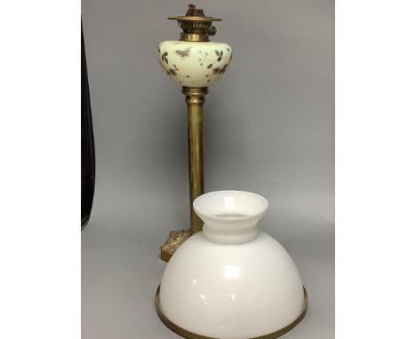   A Victorian brass and ceramic oil lamp, overall height including shade 78cm