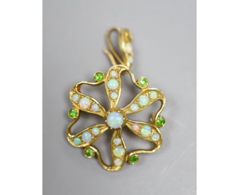   An Edwardian Art Nouveau yellow metal, opal and demantoid garnet cluster set pendant brooch,overall 40mm, gross 7 grams, on