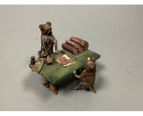   A cold painted bronze group of a ‘butcher dog’ and their client. marked Austria Geschutz, length 7cm7cm 