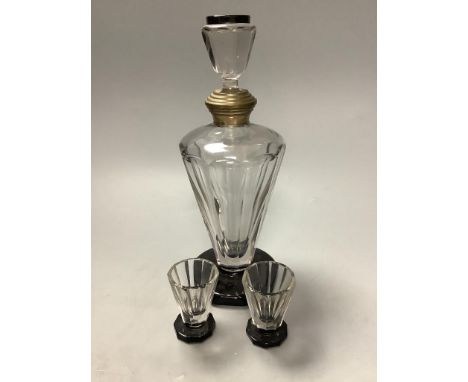   An Art Deco carafe and two tot glasses, height 23.5cm