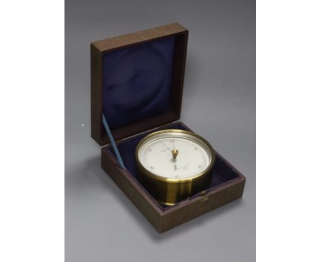   A cased Negretti &amp; Zambra brass cased barometer, diameter 12cm