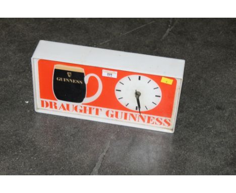 Draught Guinness clock