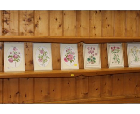 Eight Royal Worcester floral wall hanging tiles.