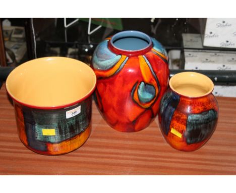 Two Poole vases and a Poole jardiniere