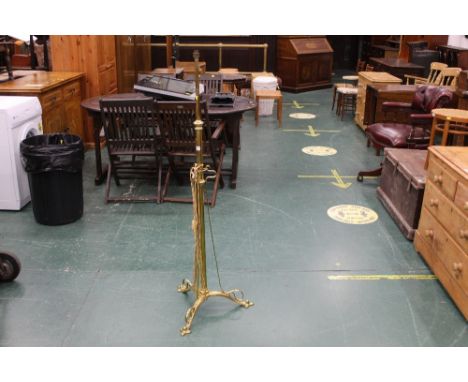 A brass standard lamp base 