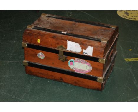 A late 19th/early 20th century tin trunk 