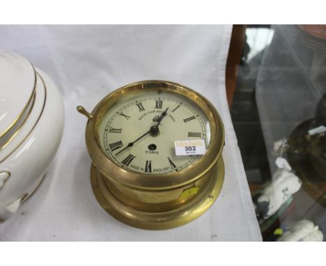 Eight day bulkhead clock