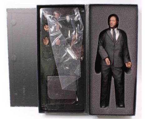An Enterbay International Ltd 1/6 scale action figure of Agent J 'Men in Black 3', sold as seen, housed in the original card 