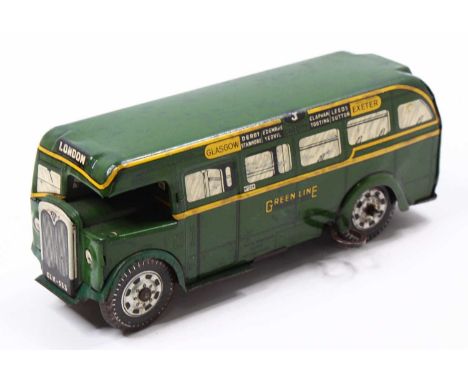 A Wells Brimtoy tinplate and clockwork Green Lines public transport bus comprising dark green and yellow body, with single fi