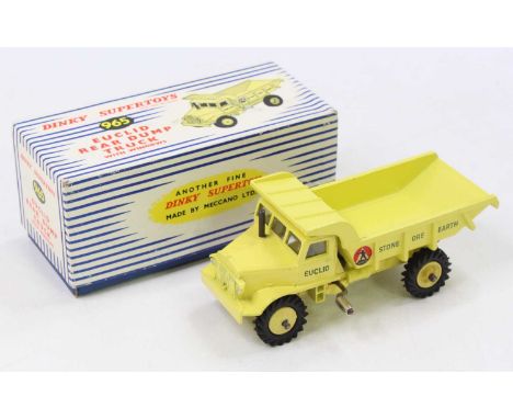 Dinky Toys No. 965 Euclid rear dump truck comprising of yellow body with Euclid livery and matching lemon yellow hubs, housed