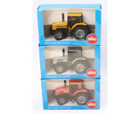 A Siku 1/32 scale The Banner Lane set to include No. 6810 white Agco Tractor, No. 8785 orange Agco 'Allis' tractor, and yello