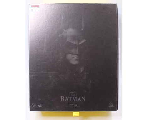 A Hot Toys 1/6 scale action figure of Batman No. DX09 'DC Comics', appears complete, but has been displayed, housed in the or