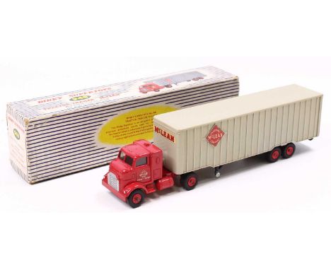 A Dinky Toys No. 948 McLean Trucking Company tractor and trailer in a red cab with grey back and red hubs with both rear door