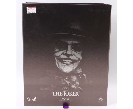 A Hot Toys Ltd 1/6 scale collectable figure of The Joker No. DX08 'DC Comics', appears complete, housed in the original foam 