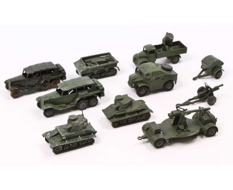 A Dinky Toys group of ten loose and playworn military models to include No. 688 Field Artillery Tractor, No. 152A Light Tank,