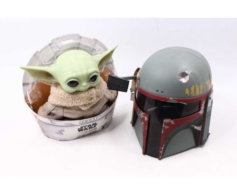 A Star Wars The Mandalorian by Mattel child action figure, together with a battery operated lifesize plastic Boba Fett mask