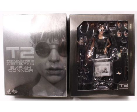 A Hot Toys Ltd 1/6 scale action figure of Sara Connor 'Terminator 2 Judgement Day', appears complete but has been displayed, 