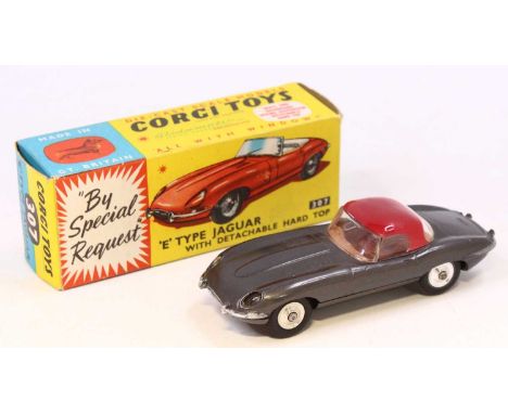 Corgi Toys No. 307 E-type Jaguar E Type with detachable hard top comprising of metallic dark grey body with brown interior an