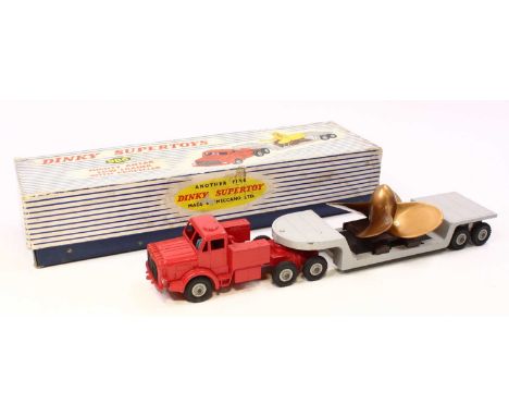 A Dinky Toys No. 986 Mighty Antar Low Loader with propeller load in red tractor unit with grey low loader trailer, grey hubs 