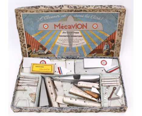 A Mecavion Aeroplane construction set of a single-seater light engined aircraft having silver fuselage with silver wings and 