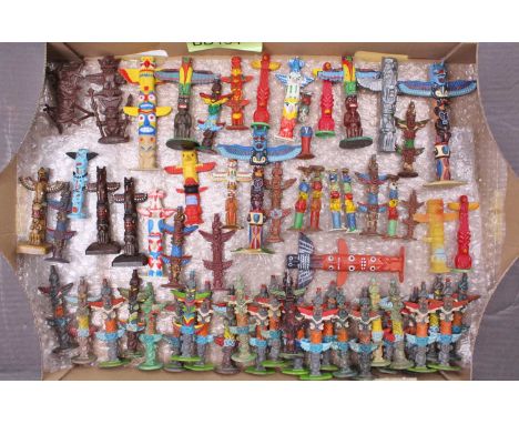 A very large collection of Vintage mainly Plastic American Indian Totem Poles by Many makers including Britain's Herald, Brit